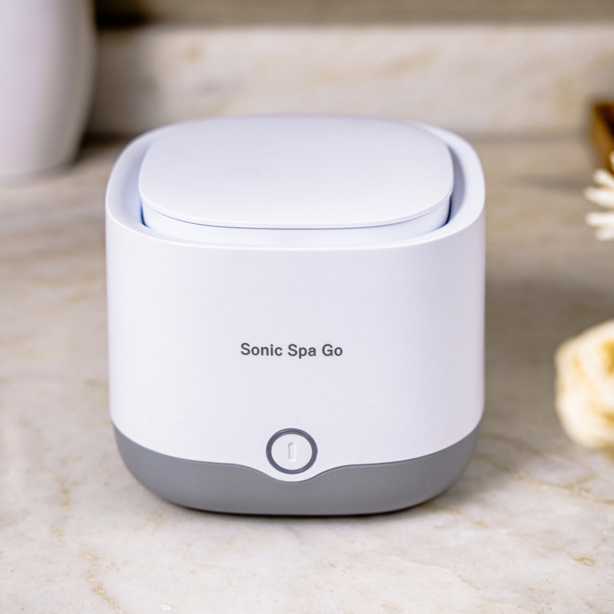White Sonic Spa Go on a bathroom counter