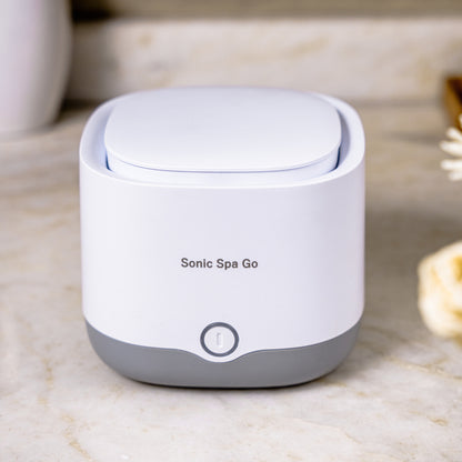 White Sonic Spa Go on a bathroom counter